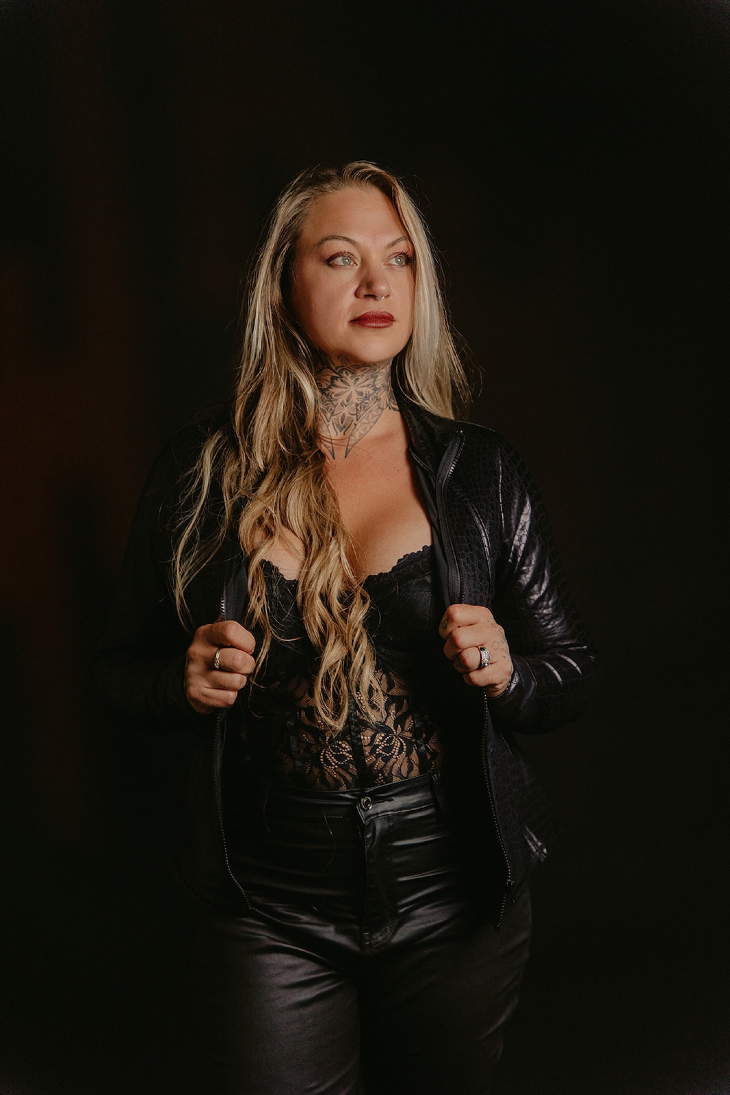 Color studio portrait of tattoo artist Kalsie
